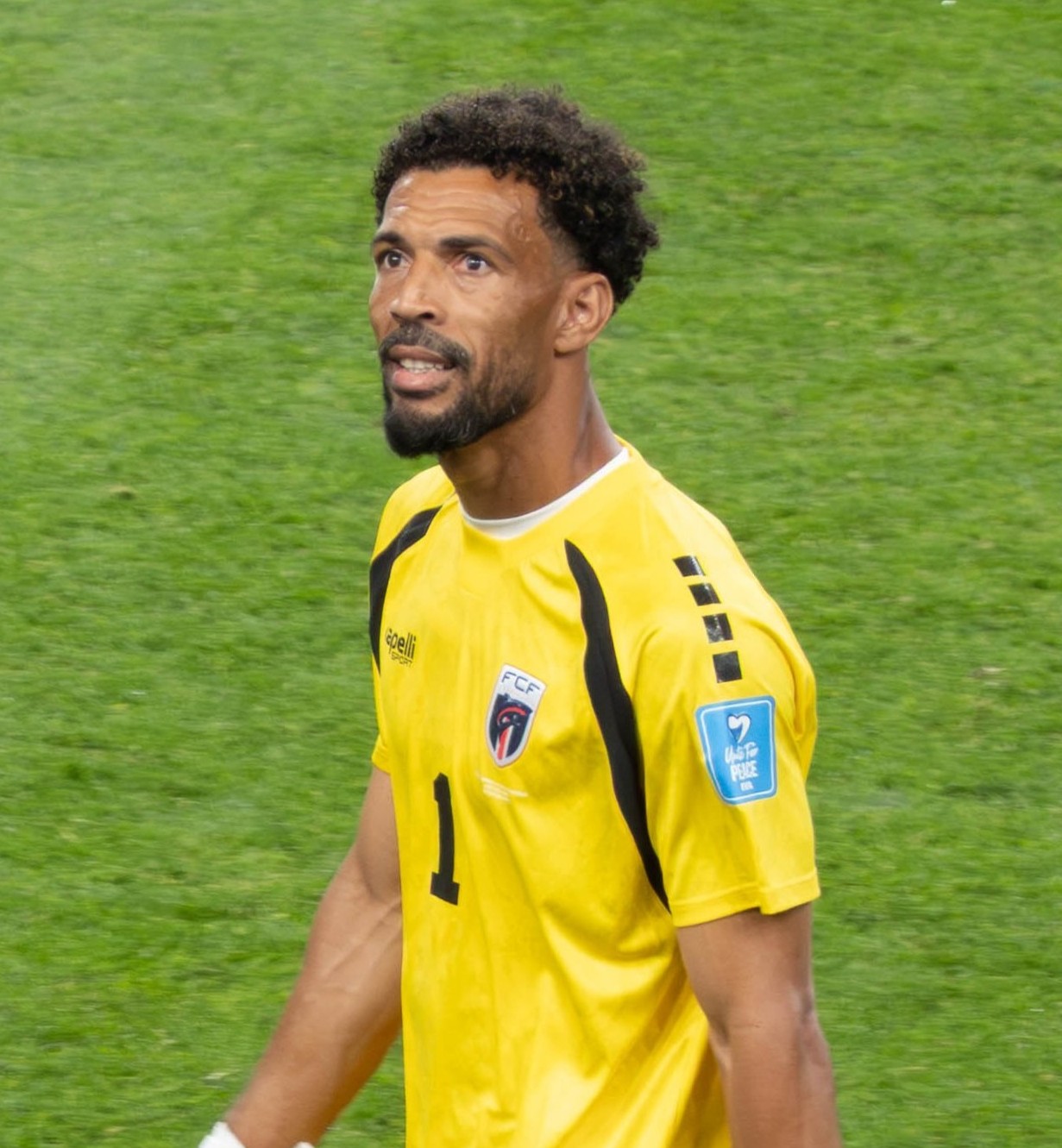 Cabo Verde goalkeeper Vozinha wearing the team's yellow jersey at the Saudi Arabia match.